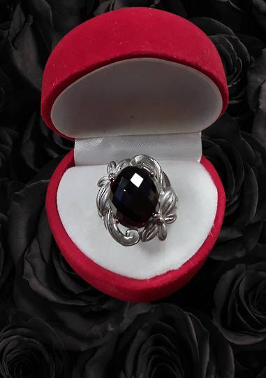Onyx Surrounded in Sterling Silver Flowers Ring